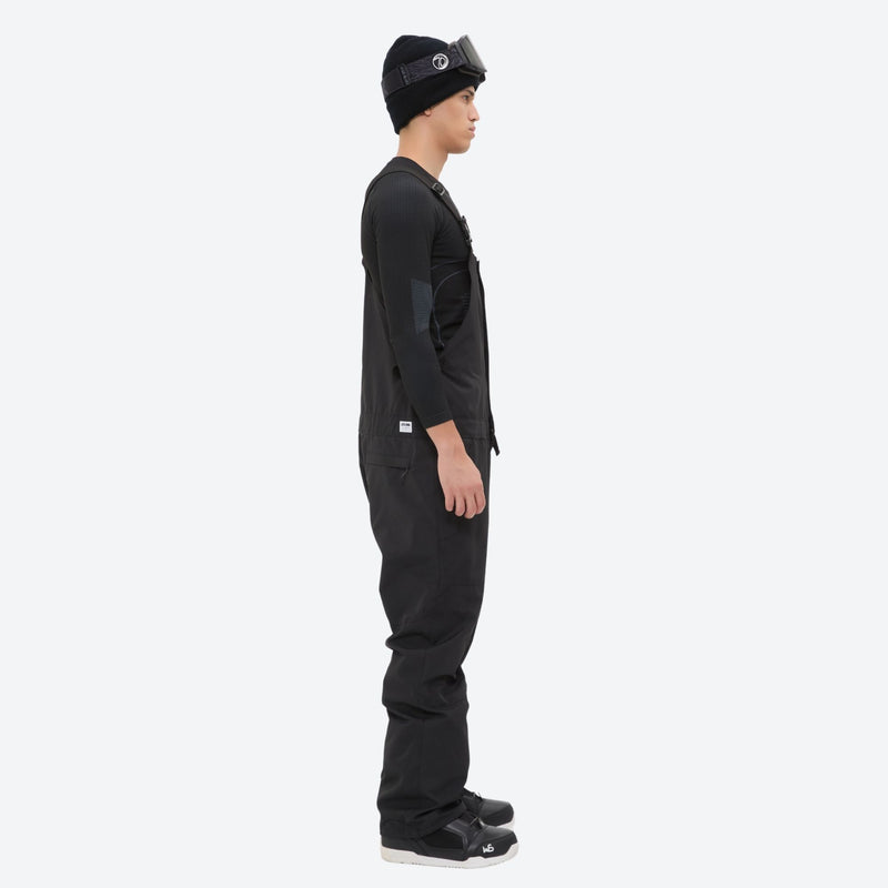 Insulated bib snow pants for men - black bib pants, on-model side view, for deep powder winter days