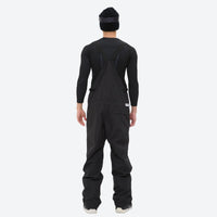 
                  
                    Men's 3L waterproof suspender snow pants - black bib pants, on-model back view, for skiing and snowboarding
                  
                