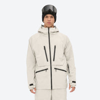
                  
                    Men's 3L waterproof suspender snow pants - cream, on-model front view, for skiing and snowboarding
                  
                