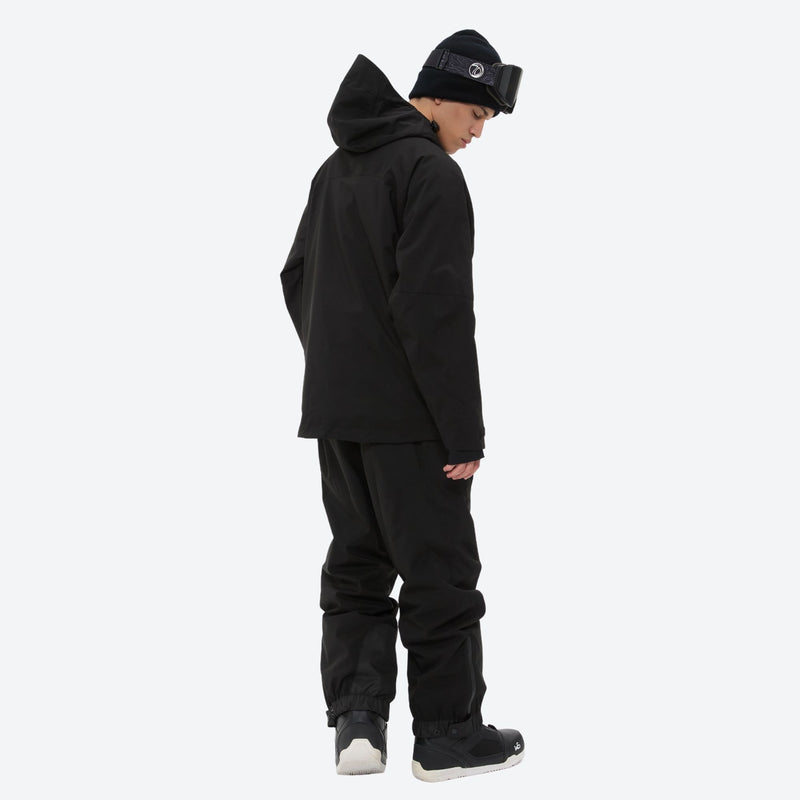 Men's adjustable ski pants with suspenders - black jacket with black pants, for resort and backcountry days