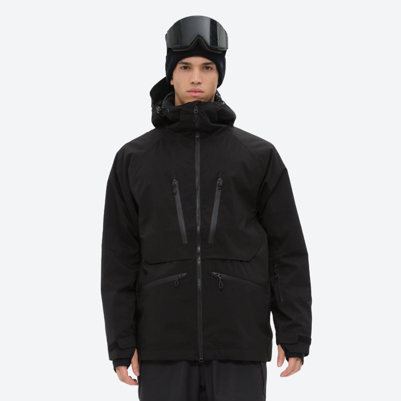 Insulated bib snow pants for men - black, on-model front view, for resort and backcountry days