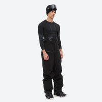 
                  
                    Men's adjustable ski pants with suspenders - black bib pants, on-model three-quarter front view, for skiing and snowboarding
                  
                