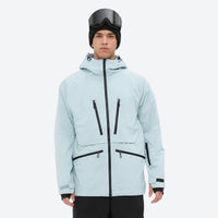 
                  
                    Insulated bib snow pants for men - ice blue, on-model front view, for cold-weather winter sports
                  
                