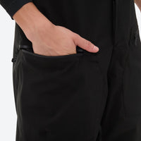 
                  
                    Men's 3L waterproof suspender snow pants - black bib pants, side pocket close-up with hand, for skiing and snowboarding
                  
                