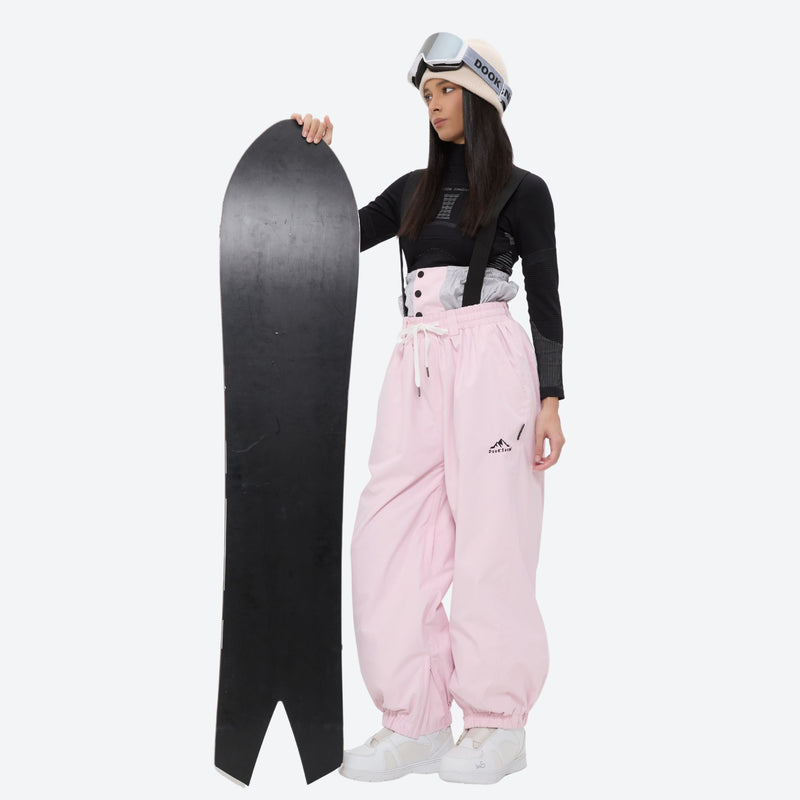 Women's quilted lining ski jacket with suspender bibs - light pink bib pants with black top, for cold-weather winter sports