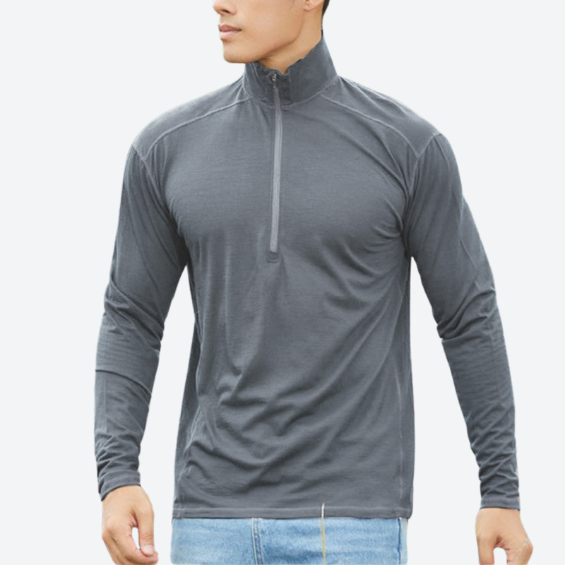 Men's soft merino wool baselayer with half-zip collar - gray merino wool half-zip top on men with jeans, front standing view