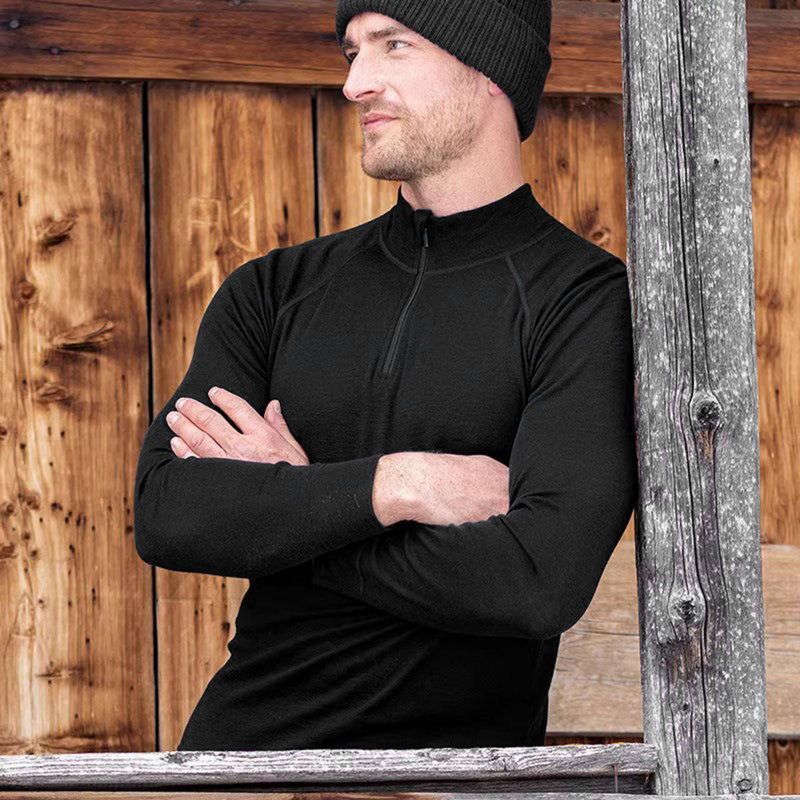 Men's breathable pure merino wool long-sleeve - black merino wool half-zip top on men with beanie