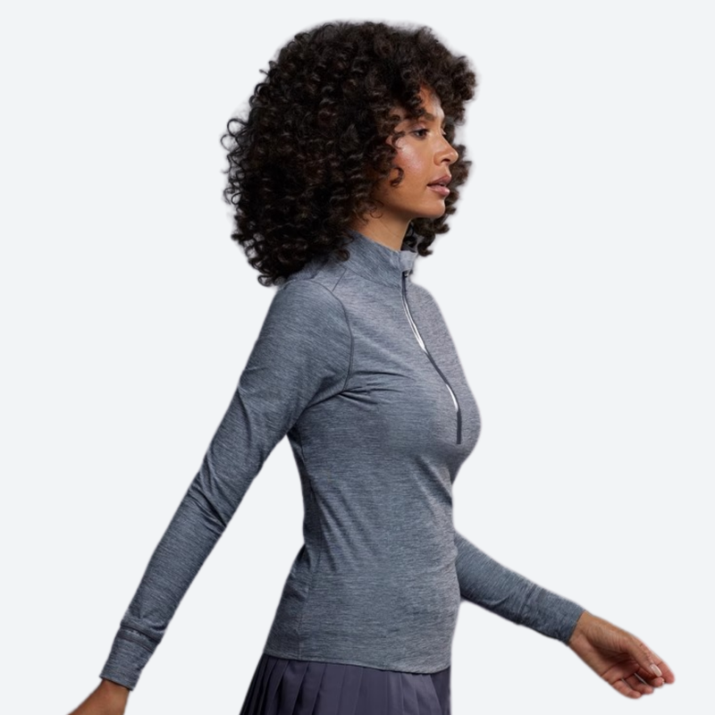 Women's soft merino wool baselayer with half-zip collar - gray merino wool half-zip top on women, side walking view