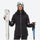 Women's 3-layer snowboard jacket and bib pants - black jacket, front with upright ski and poles, for powder and piste riding