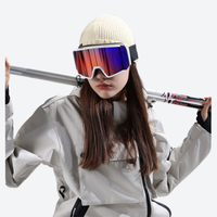 
                  
                    Ribbed knit snow cap with short brim - cream knit snow cap with brim on women with goggles and skis, for snow sports weekends
                  
                