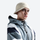 Warm knit beanie for snow sports - cream knit snow cap with brim on men, worn front view, for winter mountain trips