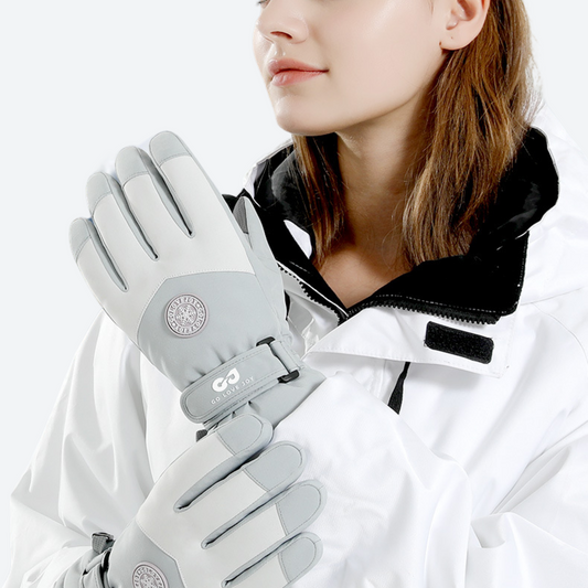 Warm snow gloves with fleece lining and strap - gray snow gloves on women, jacket wear view, for winter mountain trips