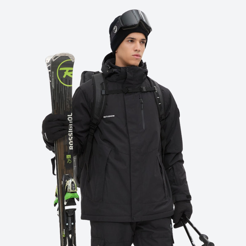 Breathable 2-layer ski jacket with suspender bibs - black, front with upright skis and poles, for powder and piste riding