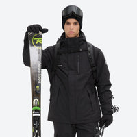 
                  
                    Unisex snowboard jacket and bibs set - black, front with upright skis and poles, for resort and backcountry days
                  
                