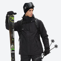 
                  
                    Unisex waterproof 2L snow jacket and bib pants series - black, front with upright skis and poles, for powder and piste riding
                  
                