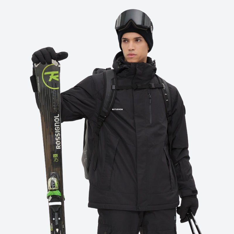 Breathable 2-layer ski jacket with suspender bibs - black, front with upright skis and poles, for cold-weather winter sports