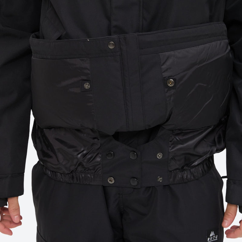 Unisex snowboard jacket and bibs set - black, inner snow skirt close-up detail, for cold-weather winter sports