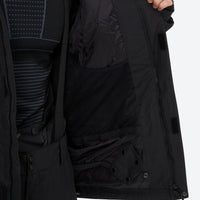 
                  
                    Breathable 2-layer ski jacket with suspender bibs - black, interior lining close-up with hand, for powder and piste riding
                  
                