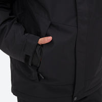 
                  
                    Breathable 2-layer ski jacket with suspender bibs - black, side pocket close-up with hand, for cold-weather winter sports
                  
                