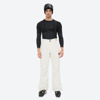 
                  
                    Breathable 2-layer ski jacket with suspender bibs - white snow pants, on-model front view, for cold-weather winter sports
                  
                