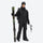 Breathable 2-layer ski jacket with suspender bibs - black, front with upright skis and poles, for skiing and snowboarding