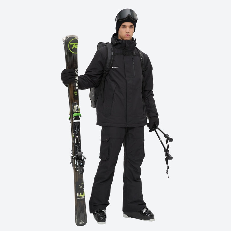 Breathable 2-layer ski jacket with suspender bibs - black, front with upright skis and poles, for skiing and snowboarding