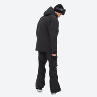 
                  
                    Unisex waterproof 2L snow jacket and bib pants series - black, on-model side view, for skiing and snowboarding
                  
                
