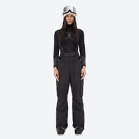 
                  
                    Women's waterproof 2L ski jacket and bib pants - black snow pants, on-model front view, for snowy mountain travel
                  
                