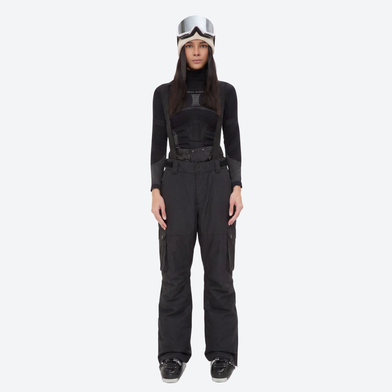 Women's waterproof 2L ski jacket and bib pants - black snow pants, on-model front view, for snowy mountain travel