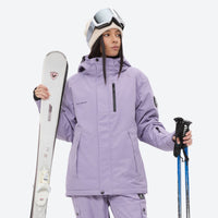 
                  
                    Women's waterproof 2L ski jacket and bib pants - lavender, front with upright skis and poles, for snowy mountain travel
                  
                