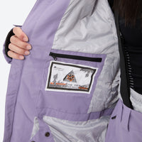 
                  
                    Women's waterproof 2L ski jacket and bib pants - lavender, for cold-weather winter sports
                  
                