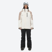 
                  
                    Women's waterproof 2L ski jacket and bib pants - white and tan colorblock jacket with black pants
                  
                