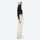 Breathable ski jacket and snow pants combo - women's cream pants with black base layer, for powder and piste riding
