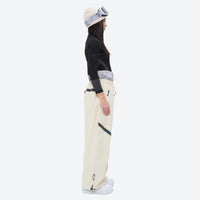 
                  
                    Breathable ski jacket and snow pants combo - women's cream pants with black base layer, fully taped seams keep snow out
                  
                