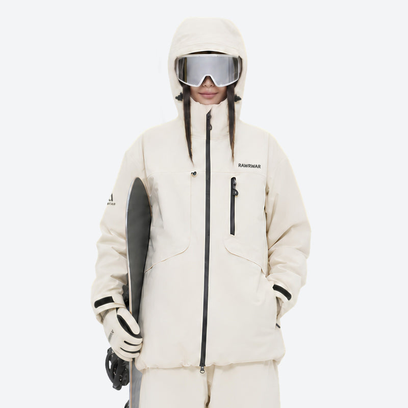 Breathable ski jacket and snow pants combo - women's cream, on-model front holding snowboard, for skiing and snowboarding