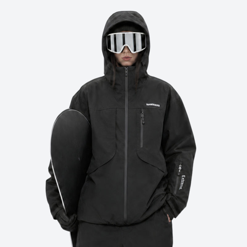 Breathable ski jacket and snow pants combo - black, on-model front with upright snowboard, for cold-weather winter sports