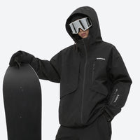 
                  
                    Colorblock snowboard jacket and pants set - black, on-model side view, for skiing and snowboarding
                  
                