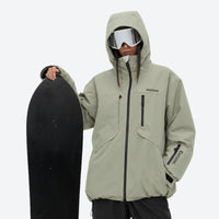 
                  
                    Waterproof snow jacket and pants set - sage green, on-model front with upright snowboard, for skiing and snowboarding
                  
                