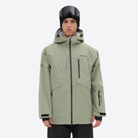 
                  
                    Unisex snowboard bib pants - sage green jacket with black bib pants, for powder days and winter commute
                  
                