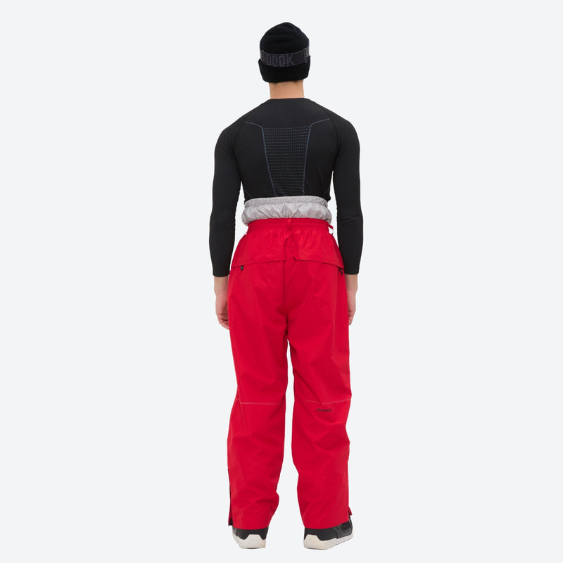 Men's colorblock snowboard jacket and pants - red pants, on-model back view, for resort and backcountry days