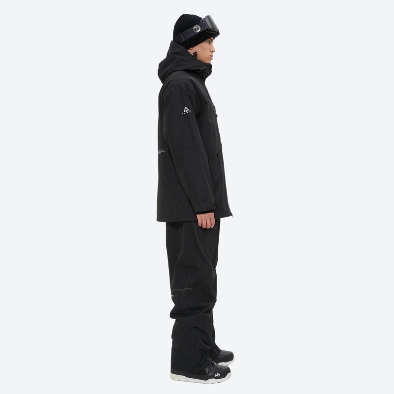 Men's colorblock snowboard jacket and pants - black, on-model side view, for skiing and snowboarding