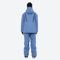 
                  
                    Men's waterproof 2L snow jacket and pants set - blue, on-model back hood view, for skiing and snowboarding
                  
                