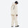 Men's colorblock snowboard jacket and pants - cream, on-model hood side view, for skiing and snowboarding
