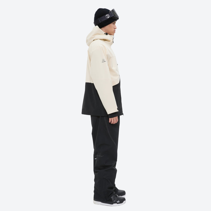 Waterproof 2L snow jacket and pants set - cream and black colorblock, on-model side view, for skiing and snowboarding