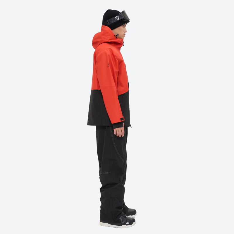Breathable 2L snowboard jacket and pants - orange-red and black colorblock, on-model side view, for skiing and snowboarding