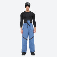 
                  
                    Men's colorblock snowboard jacket and pants - blue pants, on-model front view, for resort and backcountry days
                  
                