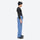 Men's waterproof 2L snow jacket and pants set - blue pants, on-model side view, for powder and piste riding