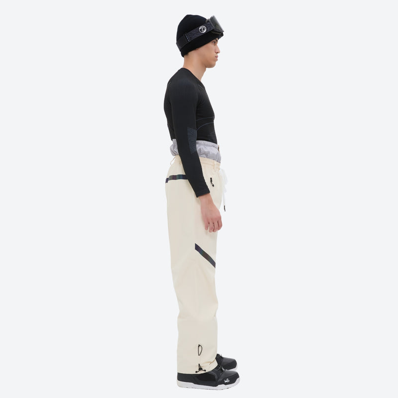Men's colorblock snowboard jacket and pants - cream pants, on-model side view, for resort and backcountry days