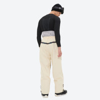 
                  
                    Men's waterproof 2L snow jacket and pants set - cream pants, on-model back view, for powder and piste riding
                  
                