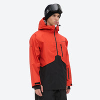 
                  
                    Breathable 2L snowboard jacket and pants - orange-red and black colorblock, for cold-weather winter sports
                  
                